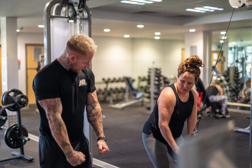 Personal Trainer training with client our Personal training introduction which is free when you sign up to a Horizon membership.