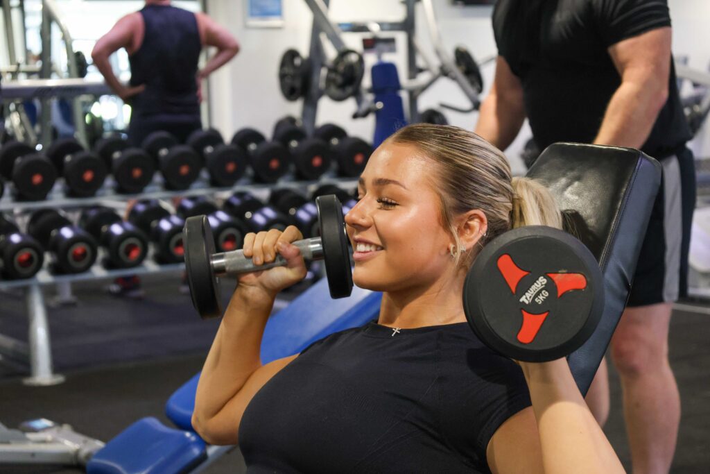 Someone lifting weights in a Horizon Leisure gym as a way to promote our Find Your Why campaign.