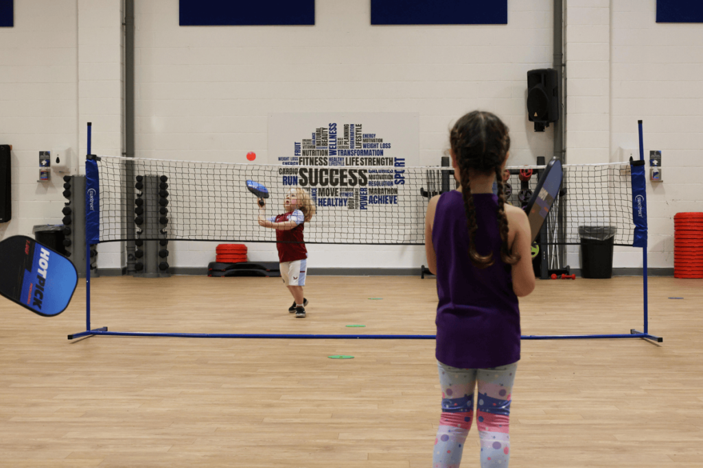 A game of Pickleball in our THRIVE Family Racquet Sports club.