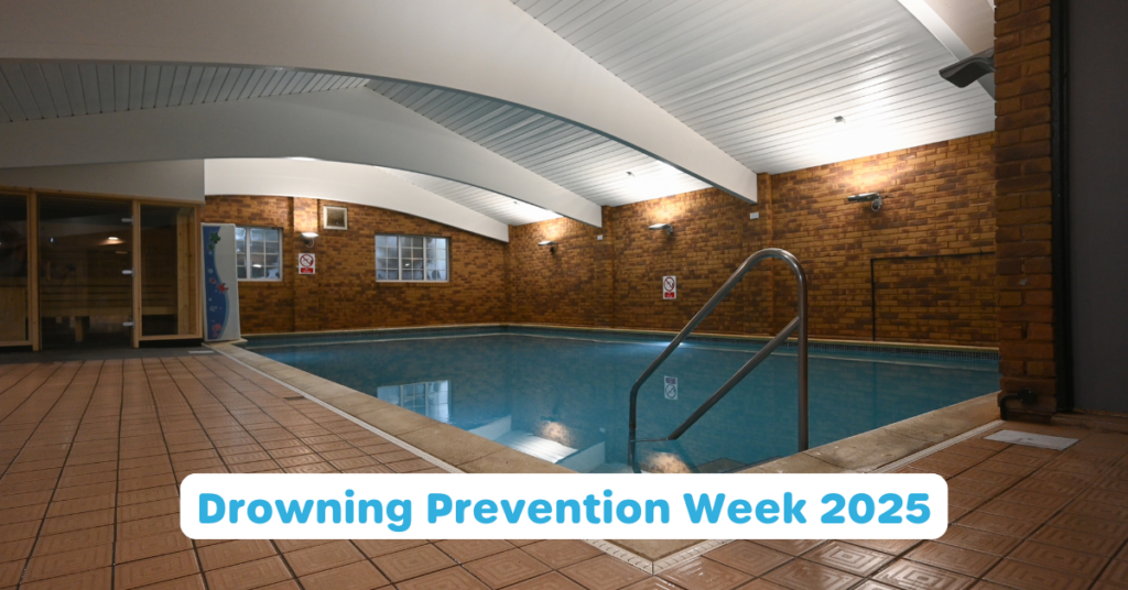 Photo of Guildford pool with text in front saying 'Drowning Prevention Week 2025'