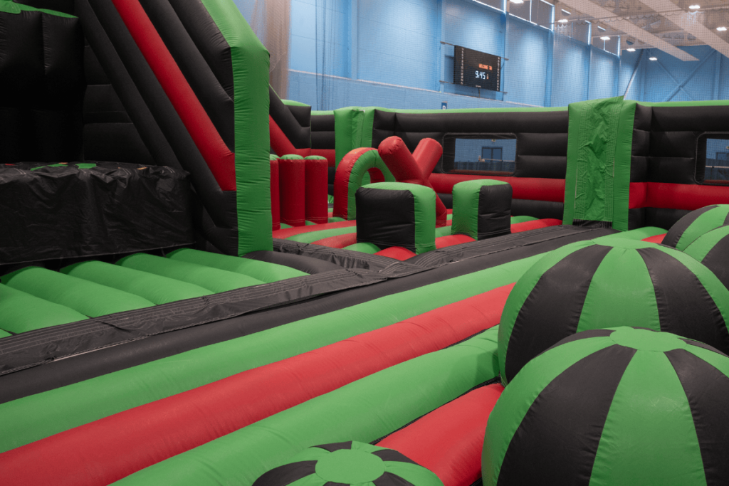 inflatable obstacle course. Showing slides