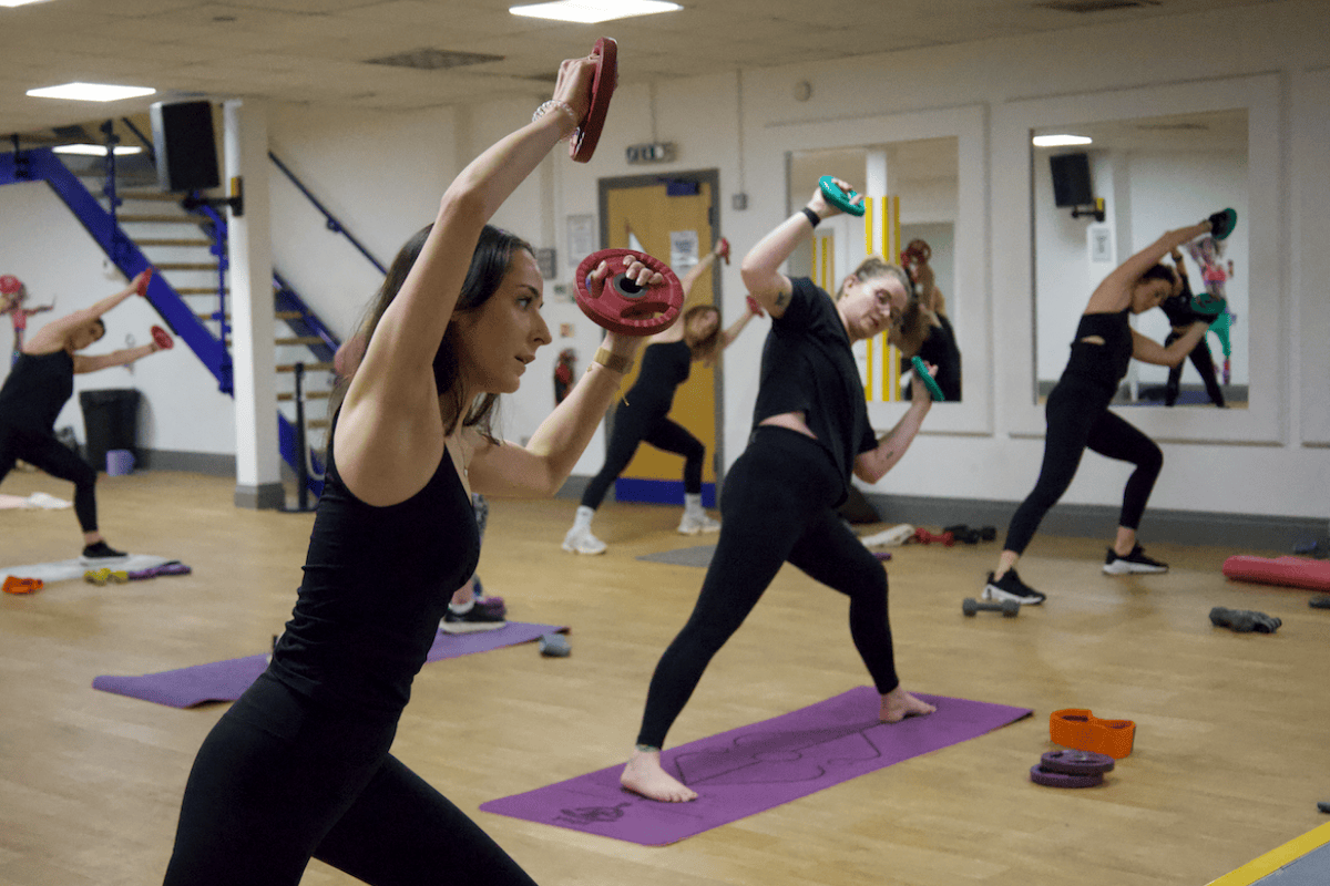 Group exercise class with weights with community discount cards