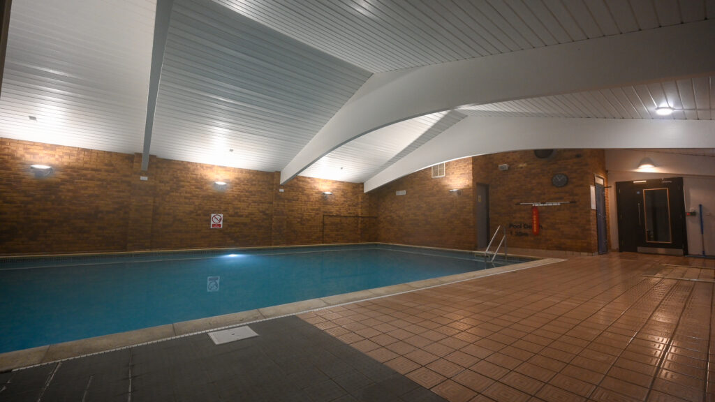 Indoor swimming pool with modern design.