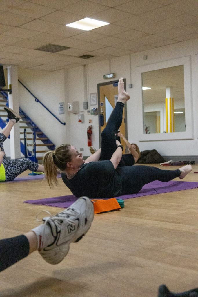 Participants engaged in les mills classes