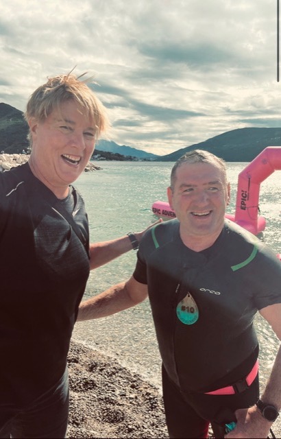 Two swimmers completed the ultra swim 33.3 by the water's edge.