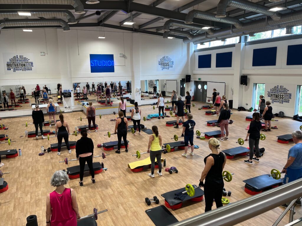 Group fitness class in studio setting