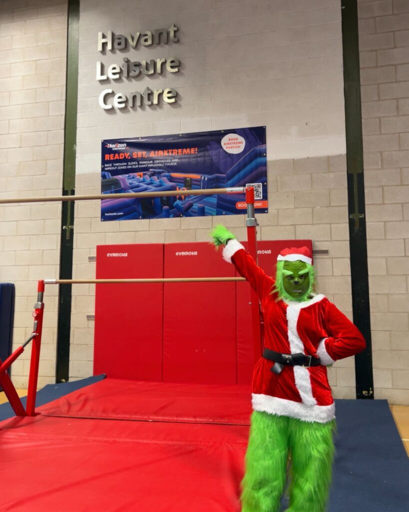 Person in Grinch costume celebrating Christmas airxtreme horizon havant