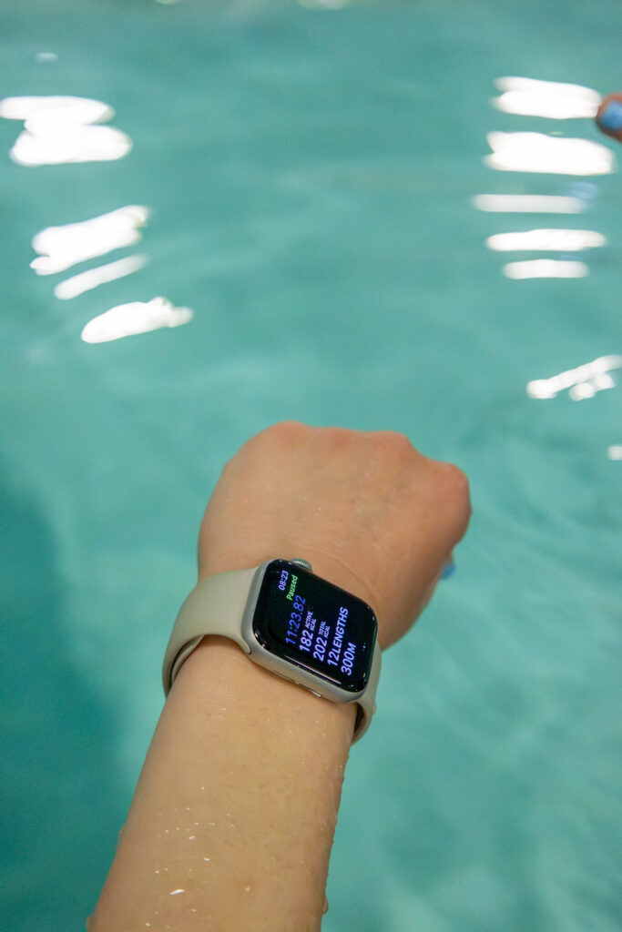 Wristwatch displaying swim workout data