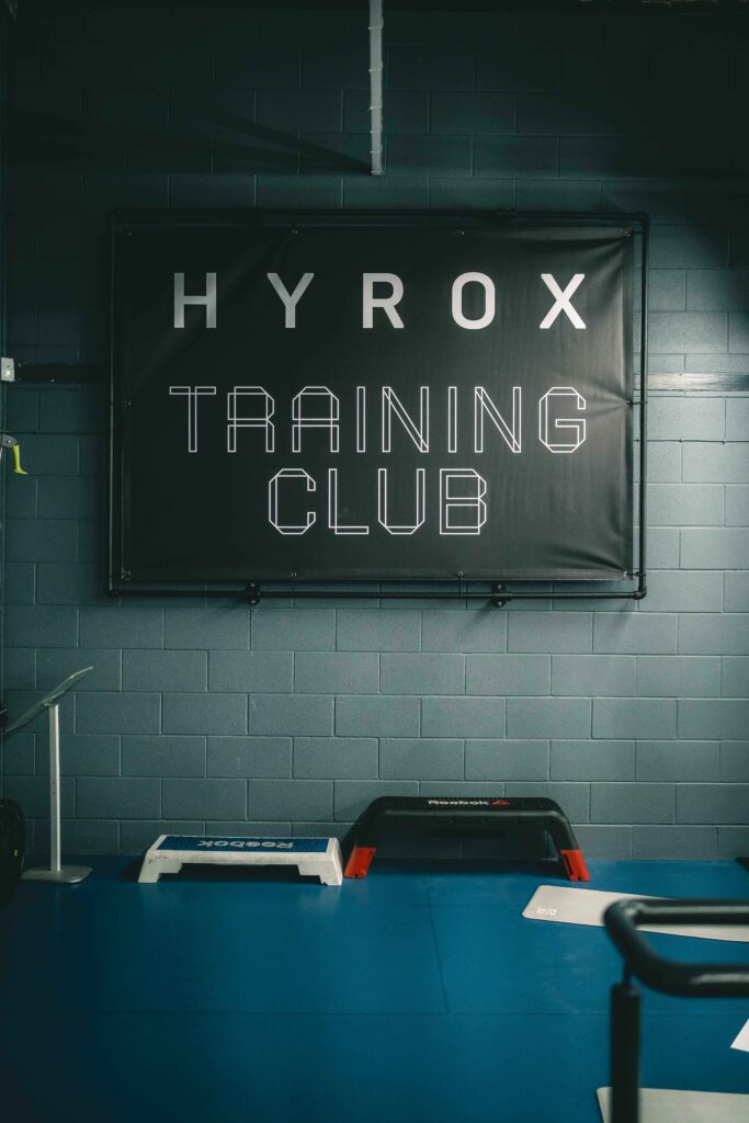 Hyrox Training Club sign on wall
