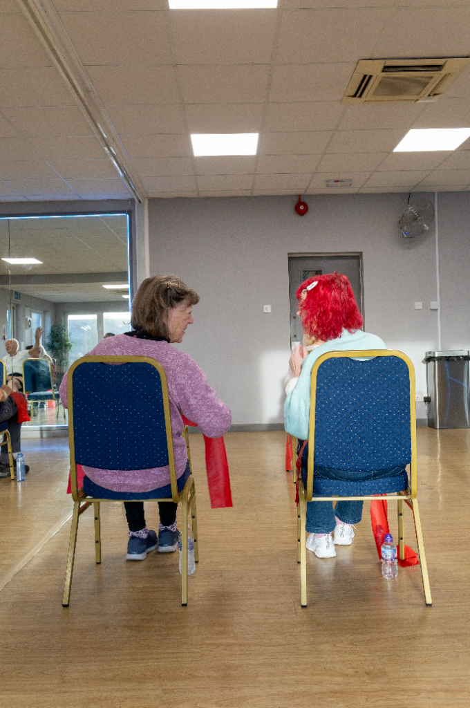 Two women sitting on chairs mental health awareness